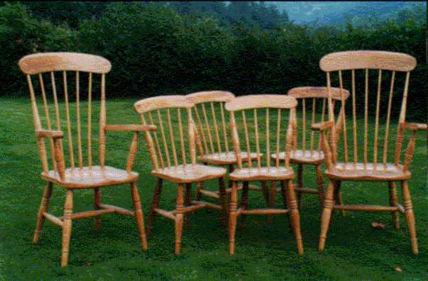 A set of Comb Back Winddsorchairs in Oak